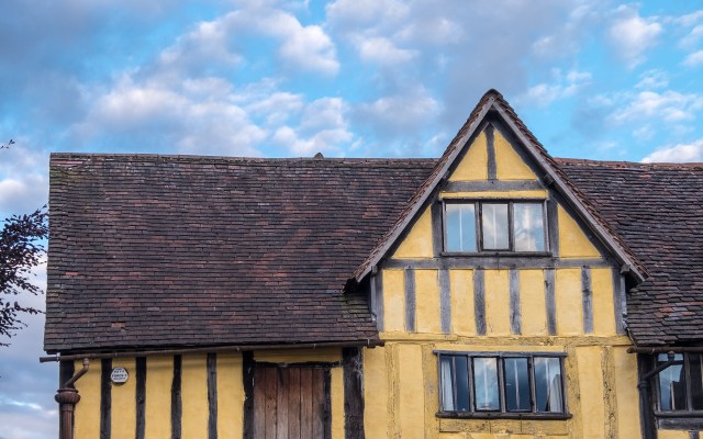 Half-timbered building, brightly coloured.